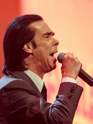 Náhledový obrázek k článku Zdivočelý bůh Nick Cave. Noty vole po stopách génia, kazatele i truchlícího otce